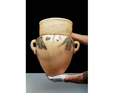 New Kingdom, 18th to 20th Dynasty, Ca. 1550 - 1069 BC An Egyptian alabaster amphora with stunning honey-yellow hues. The vess