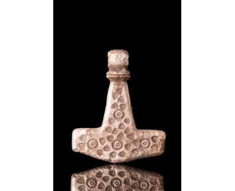 Ca. AD 800 - 1000 A Viking pendant in the form of Mjolnir, the legendary hammer of the lightning god Thor. This example is ma