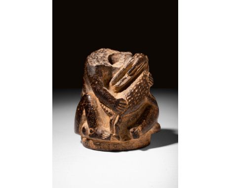 Ca. 664 - 332 BC An Egyptian period steatite top of a cosmetic vessel made in high relief. This depicts a seated human figure