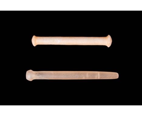 Ca. 1550 - 1069 BC An Egyptian New Kingdom pair of quartz rods with an amazing tubular body and a shiny polished surface. Dur