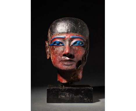 Third Intermediate Period, 22nd to 24th Dynasty, Ca. 945 - 715 BC An Egyptian wooden painted and inlaid head of a priest. Bla