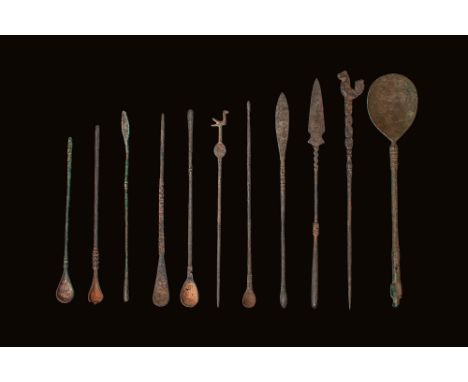 Ca. AD 100 - 300 A large group of eleven Roman bronze decorated surgical tools. They are presented with long and thin handles