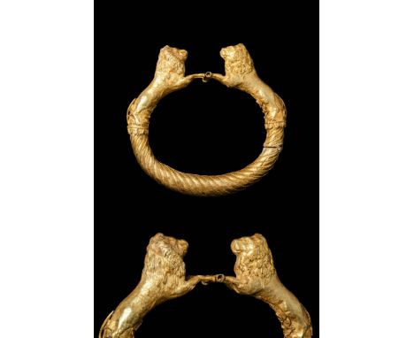 Ca. 300 - 200 BC A Hellenistic gold bracelet composed of a tubular-shaped central body decorated with intertwined gold thread