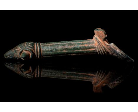 Ca. AD 100 - 300 A finely modelled, hollow cast bronze example of a patera handle terminating with a ram’s head. The patera w