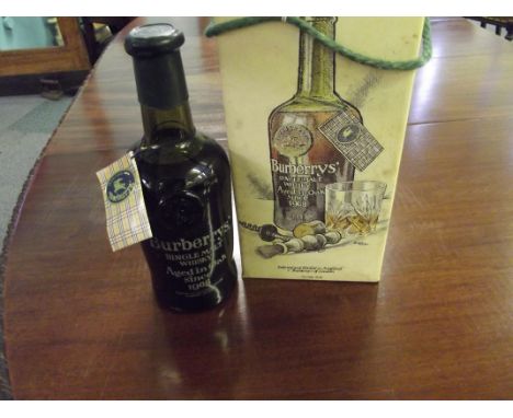 A bottle of BUBERRYS  single malt scotch whisky, unopened with original tag and box.