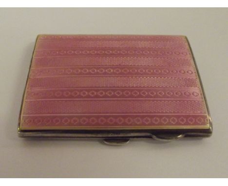 Silver and enamel cigarette/card case, rectangular form, the hinged lid with guilloche decoration the opposing side with engi