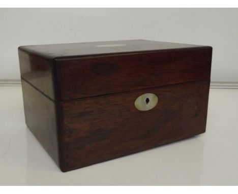 Victorian rosewood travelling vanity case, hinged lid enclosing a well fitted interior containing various bottles and accesso