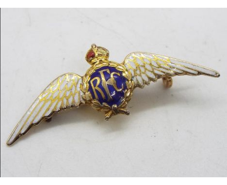A yellow metal and enamel RFC sweetheart brooch stamped 9ct, approximately 2.5 grams all in.