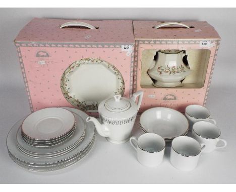 A quantity of dinner and tea wares to include Royal Worcester Classic Platinum and other, part boxed. [3]