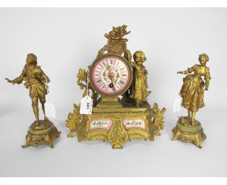 Early 19th century mantel clock garniture, Roman numerals to a 3" enamel dial above inset floral panels, approximately 28 cm 