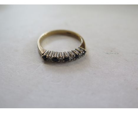 A 9ct yellow gold 9 stone ring - size L - approx 1.8 grams, some light usage 