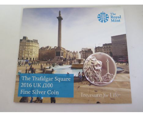 A 2016 fine silver and uncirculated £100 coin, featuring a Trafalgar Square design, with presentation pack, coin approximatel