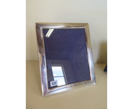 A large silver Carr's photo frame, 31cm x 26cm, minor dent, otherwise good 