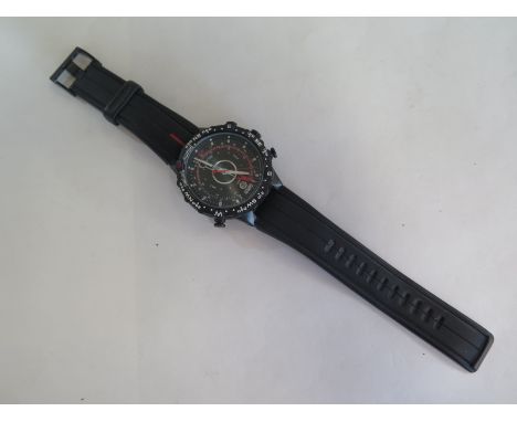 A Timex Intelligent Quartz wristwatch including compass, 60mm wide including buttons, generally good, in running order 