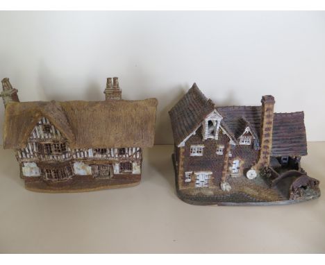 A well modelled studio stoneware pottery model of a Tudor house, together with a stoneware model of a Mill House, impressed m
