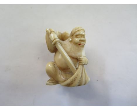 A 19th Century carved bone Netsuke of a sage - 4cm H - good condition 