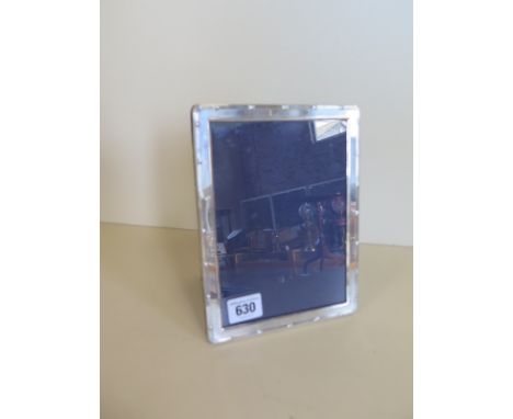 A Carr's silver photo frame, 21cm x 16cm, some usage marks, but generally good 