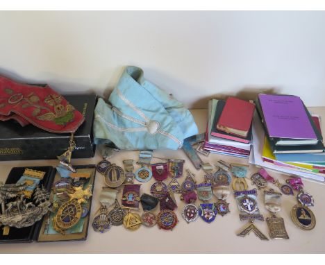 A collection of Masonic ephemera including over 20 silver Masonic medals together with some gilt metal medals and other ephem