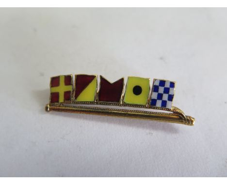 A silver and enamel flag brooch, 5cm long, in good condition 