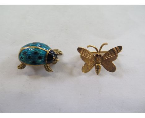 An 18ct yellow gold enamel ladybird brooch 20mm long, and an 18ct yellow gold butterfly brooch, both marked 750, both good co