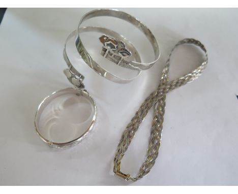 A modern silver slaves bangle, a silver bracelet, total weight approx 100 grams 