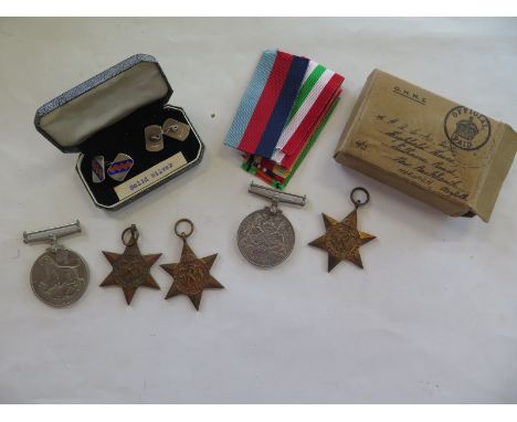 Five WWII medals un-named box, named to GA Cork nad a pair of silver cuff-links 