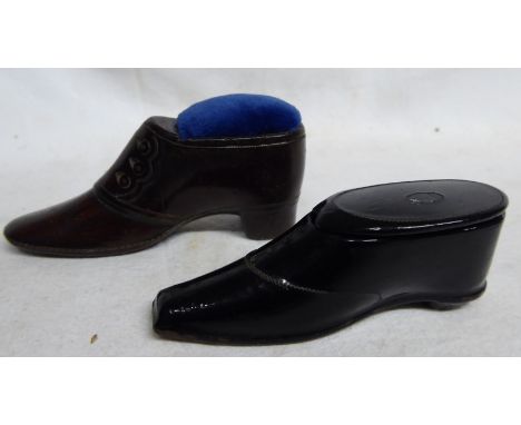 A 19th Century treen Snuff Box in the form of a shoe and a similar shoe shaped pin cushion. 
