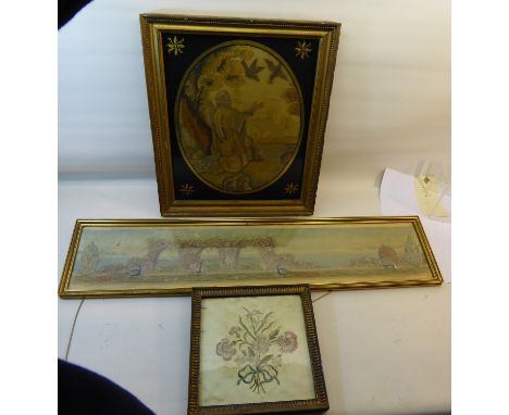 An early 19th Century oval embroidered silk panel of Elijah being fed by the ravens in a Verre Églomisé frame.  13" (33cms) x
