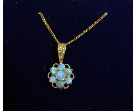 A silver gilt opal set Pendant on a fine link neck chain.