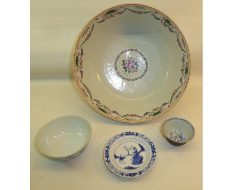 A K'ang Hsi Saucer Dish with figures in blue and white, 4" (10cms) diameter; an 18th century small Chinese Bowl bearing a lab