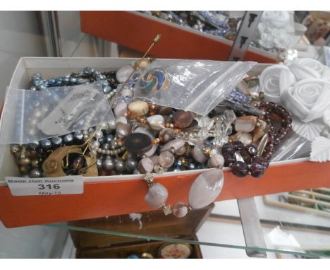 box of vintage costume jewellery