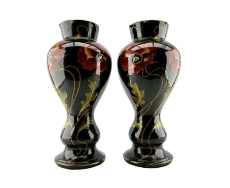 Pair of large Art Nouveau pottery vases, each painted with stylized poppies, over a deep brown and green glaze, unmarked, but