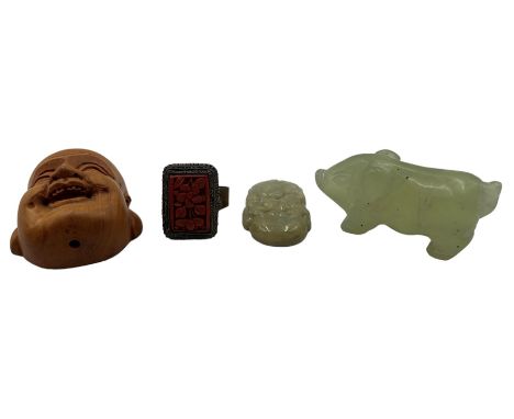 20th century Chinese jade pendant in the form of a rat, a jade pig L4cm, cinnabar and copper ring and a carved fruitwood mask