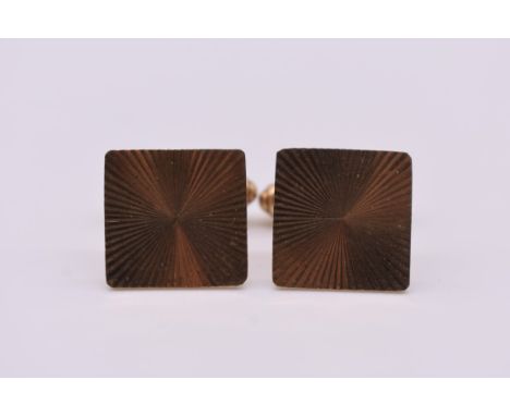 A pair of engine turned gold cufflinks, hallmarked 375, 6.7g. 