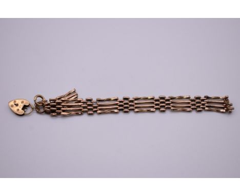 A gold gate bracelet with padlock clasp, hallmarked 375, 13.2g, (a.f.). 