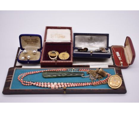 A group of gold and other jewellery, to include a 9ct gold ring; two stick pins; a citrine brooch; a two strand coral necklac