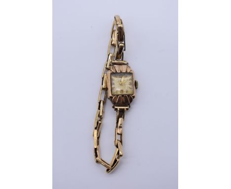 A vintage Avia 9ct gold manual wind ladies watch, 8.1g. 