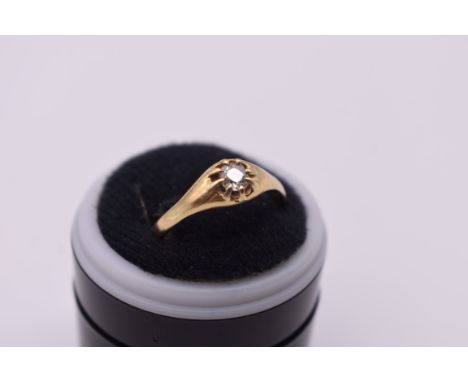 A gold and diamond solitaire ring, stamped 18ct, the brilliant cut stone approximately 0.33ct, 4.2g total weight. 