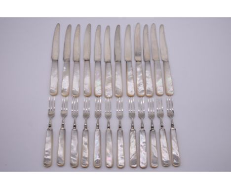 A set of twelve pairs of silver and mother of pearl dessert knives and forks, by Mappin &amp; Webb Ltd, Sheffield 1936/7. 