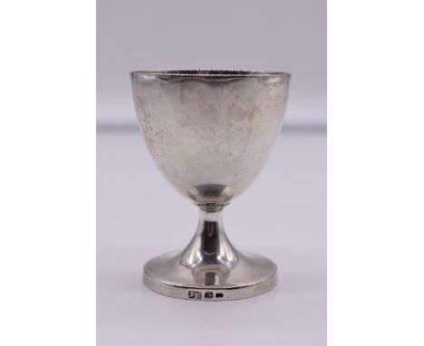 A white metal duck egg cup,&nbsp;by J R,&nbsp;marks indistinct, 8cm.
