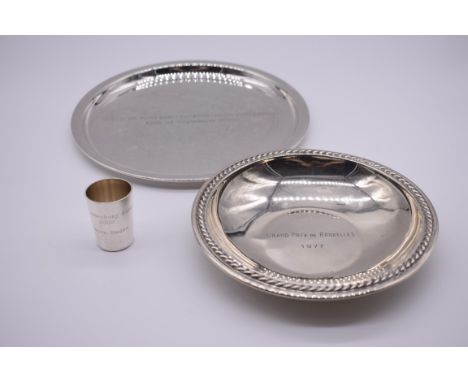 A German white metal tray, by Hermann Emil-Waldstetten, Baden-Württemberg, stamped 925, 22.3cm diameter; together with a silv