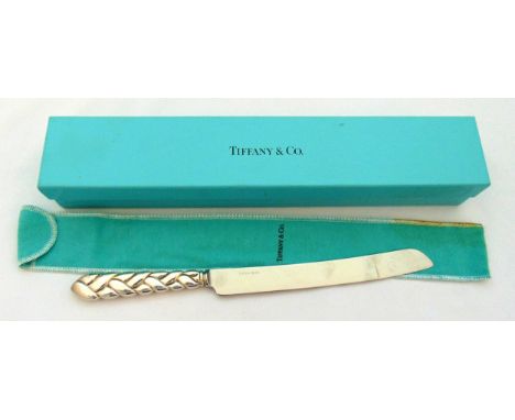 Tiffany and Co. sterling silver bread knife in original packaging and cloth sleeve