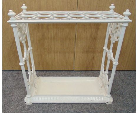 An early 20th century rectangular white cast iron umbrella and stick stand, 64 x 66 x 28cm