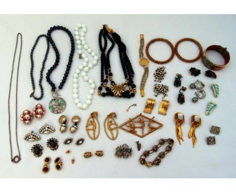 A quantity of costume jewellery to include bracelets, earrings, brooches, necklaces and a pair of Christian Dior earrings
