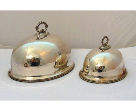 Two Walker and Hall silver plated meat dish covers with beaded pierced handles