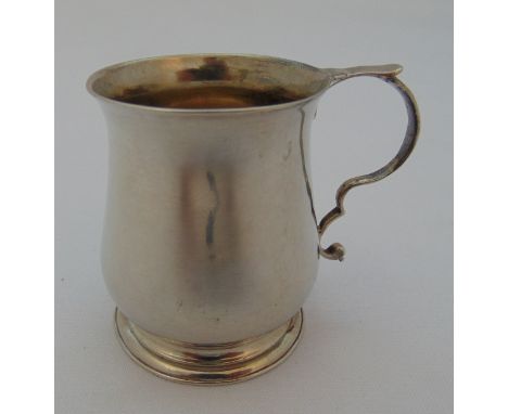 A George II hallmarked silver Christening cup with double scroll handle on circular spreading base, London 1751, approx total