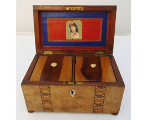 An early 20th century tea caddy of rectangular form, inset with Tunbridge ware bands, 13 x 23 x 13.5cm