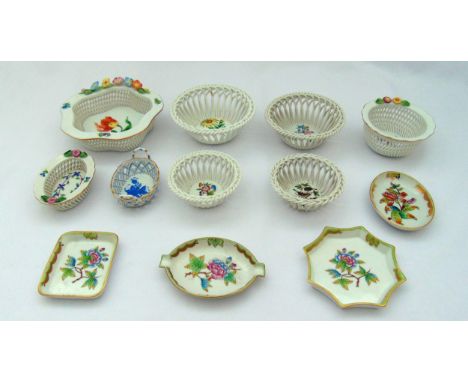 A quantity of Herend porcelain bonbon dishes and pin trays of various shape and form,  (12)