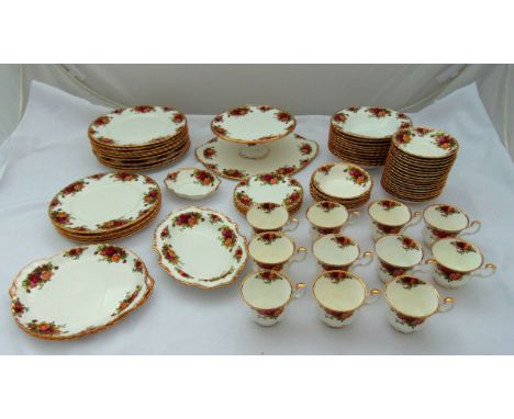 Royal Albert Old Country Roses part dinner service to include plates, bowls, cups, saucers, a bread board, a cake stand and s