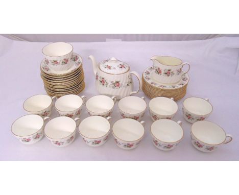 Minton Spring Bouquet teaset for twelve place settings to include cups, saucers, plates, a teapot, milk jug and a sugar bowl 